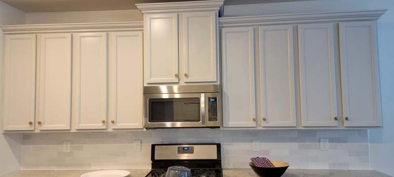 Remodeled kitchen with stainless steel fridge. - Marshall's Handyman